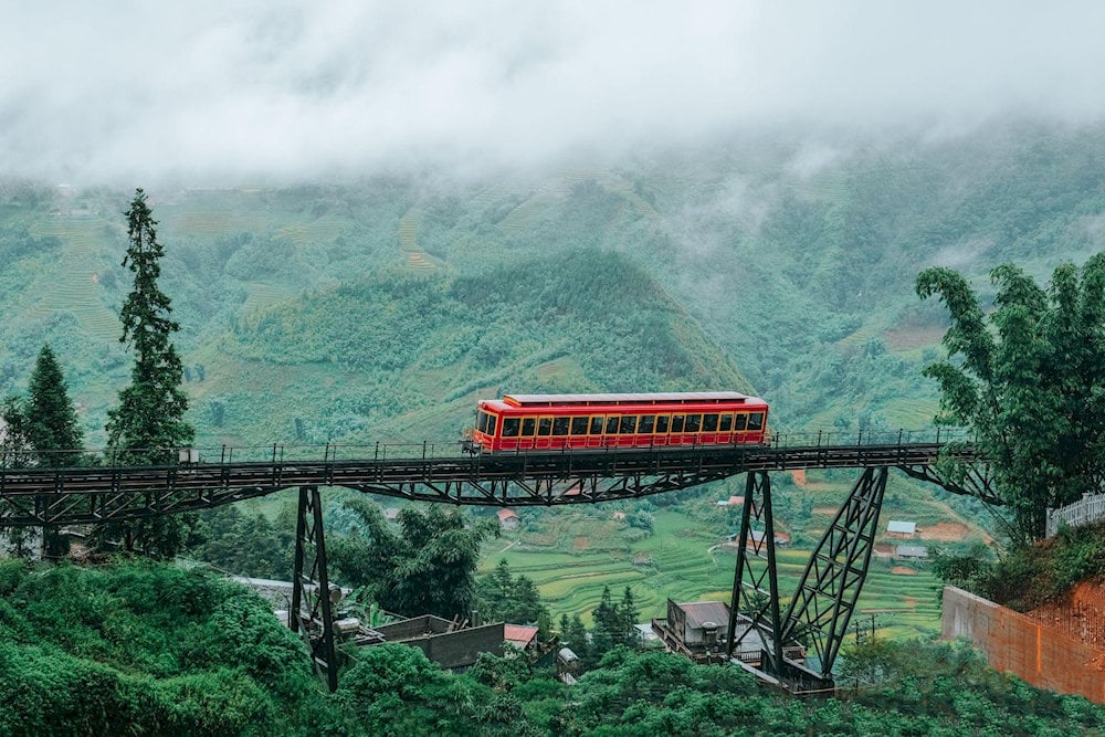 Passengers can enjoy panoramic views of Muong Hoa Valley through the large windows of the mountain railway's European-style carriages